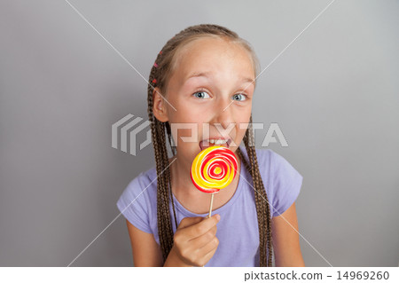 happy girl with lollipop happy girl with lollipop 14969260