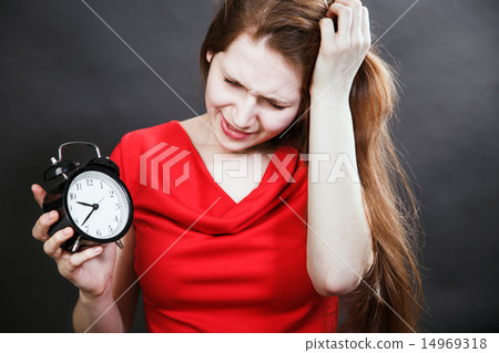 girl in red dress late with alarm clock girl in red dress late with alarm clock 14969318