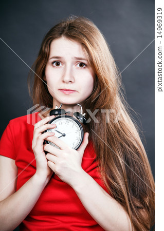 girl in red dress late with alarm clock girl in red dress late with alarm clock 14969319