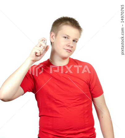 boy, the teenager spraying fragrance perfume.. boy, the teenager spraying fragrance perfume.. 14970765