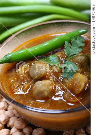 indian spicy chana masala with raw chickpeas indian spicy chana masala with raw chickpeas 14973469