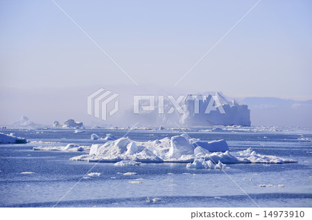 Giant iceberg floating in Disko bay Giant iceberg floating in Disko bay 14973910