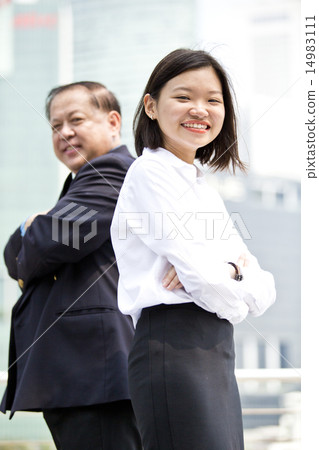 Asian businessman & female executive portrait 14983111