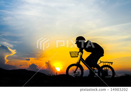 Silhouette of the cyclist riding a road bike Silhouette of the cyclist riding a road bike 14983202