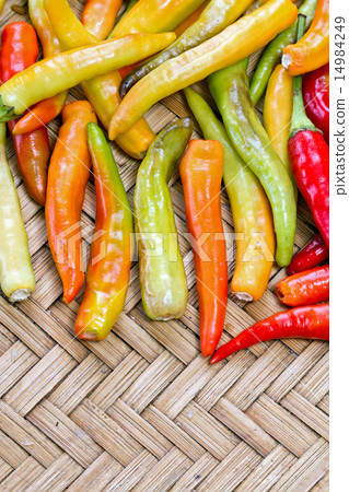 pile of yellow and red thai goat pepper 14984249
