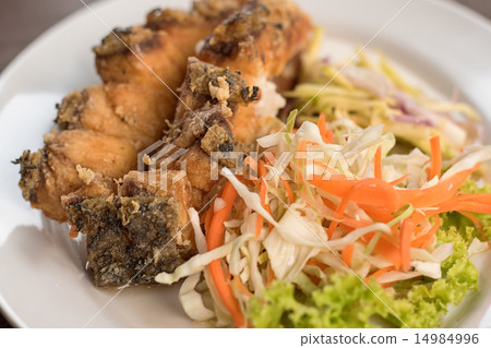 Snapper fish topped with chili sauce 14984996