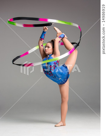 teenager doing gymnastics dance with ribbon teenager doing gymnastics dance with ribbon 14986919