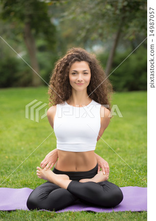 Pretty woman doing yoga exercises Pretty woman doing yoga exercises 14987057