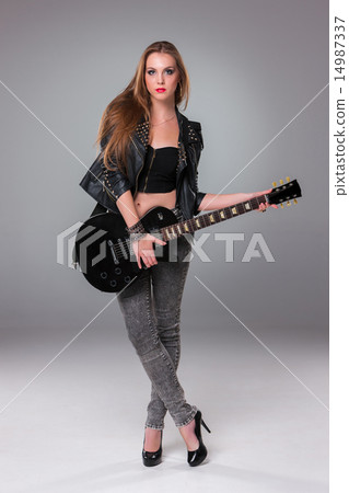 Beautiful girl playing guitar Beautiful girl playing guitar 14987337
