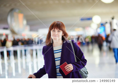 Beautiful young passenger at the airport Beautiful young passenger at the airport 14990149