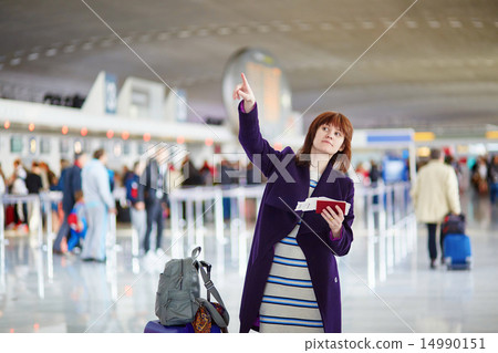 Beautiful young passenger at the airport Beautiful young passenger at the airport 14990151
