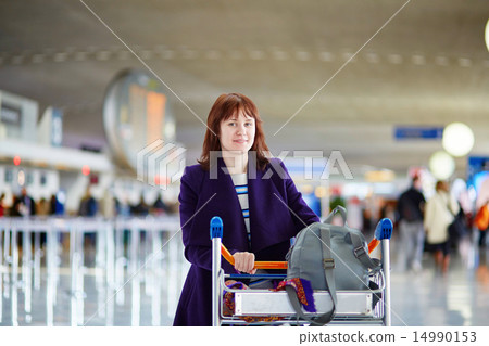Beautiful young passenger at the airport Beautiful young passenger at the airport 14990153