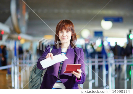 Beautiful young passenger at check-in counter 14990154