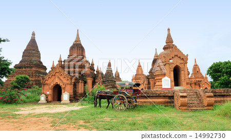 The temples and the horse carriage in Bagan The temples and the horse carriage in Bagan 14992730