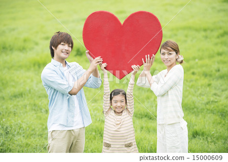 Parent and child smiling with a heart in the steppe 15000609