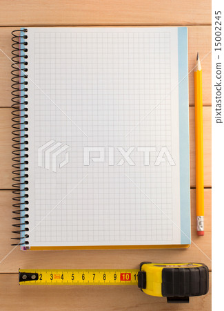 tape measure and pencil on wood 15002245