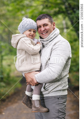 Happy young father holding his little daughter 15003868