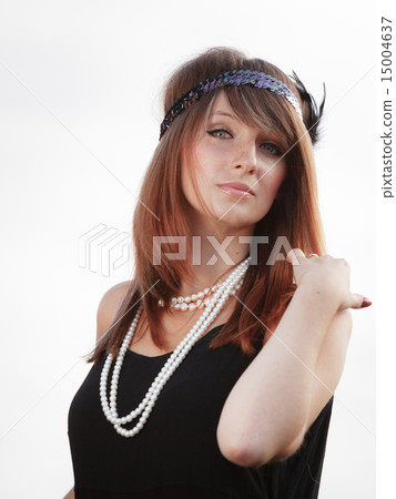 Flapper girl woman in1920s style portrait outdoor 15004637