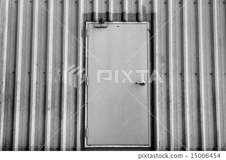 iron door on corrugated metal sheet 15006454