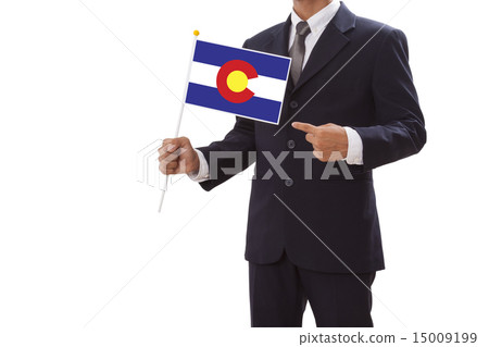 Businessman in suit holding of Colorado Flag  15009199