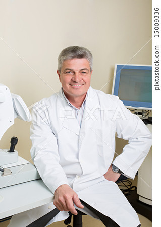 portrait of handsome elderly eye doctor 15009336