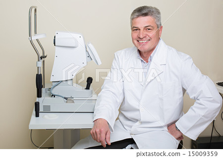 portrait of handsome elderly eye doctor 15009359