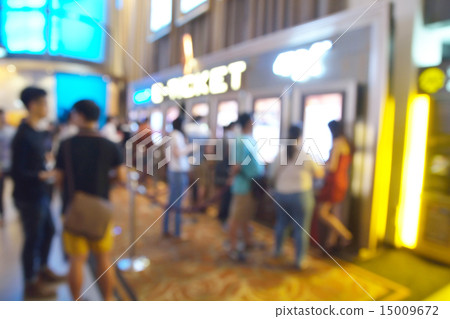 Blur or Defocus People buy Movie Ticket 15009672