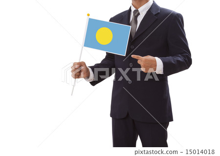 Businessman in suit holding of the Palau Flag  15014018