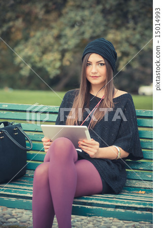 young beautiful brunette woman girl using tablet young beautiful brunette woman girl using tablet 15014993