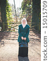 young beautiful muslim woman at the park 15015709