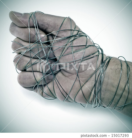 man hand tied with wire man hand tied with wire 15017293