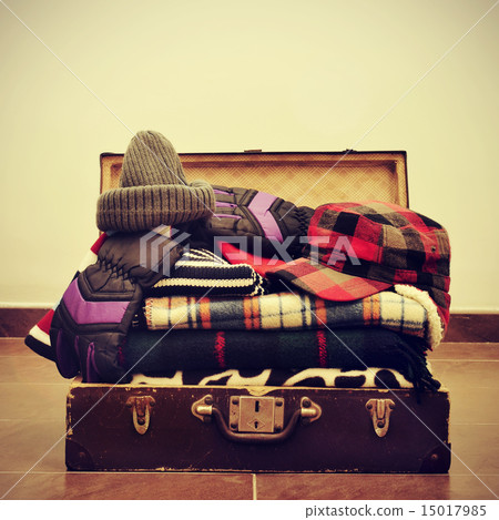 warming clothes in a suitcase 15017985