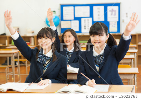 Junior high school student waving hands Junior high school student waving hands 15022763