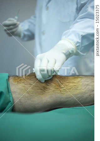 Surgeon doctor injecting patient hospital clinic 15023375