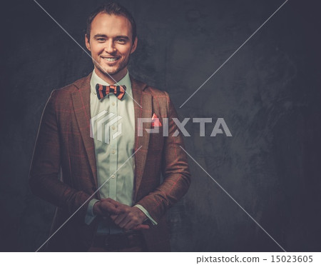Sharp dressed fashionist wearing jacket and bow tie Sharp dressed fashionist wearing jacket and bow tie 15023605