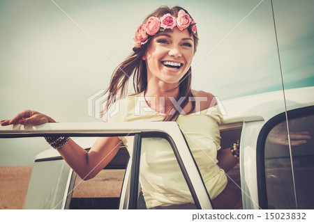 Hippie girl in a van on a road trip Hippie girl in a van on a road trip 15023832