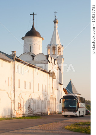 Tourist bus near the monastery walls. Russia 15025782