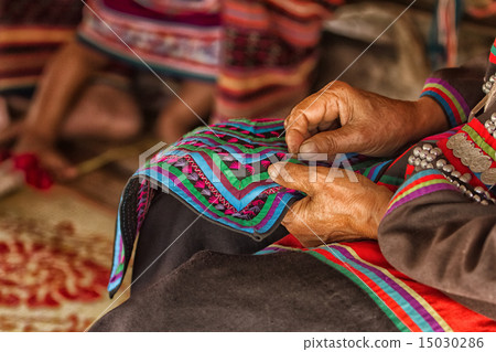 Woman hand stitching cloth make Thai fabric Woman hand stitching cloth make Thai fabric 15030286