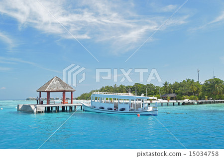Passenger boat docked at Maldives resort. Passenger boat docked at Maldives resort. 15034758