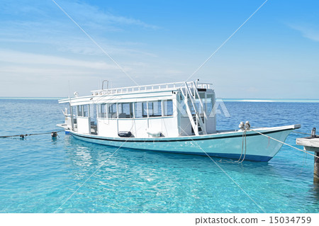 Passenger boat docked at Maldives resort. Passenger boat docked at Maldives resort. 15034759