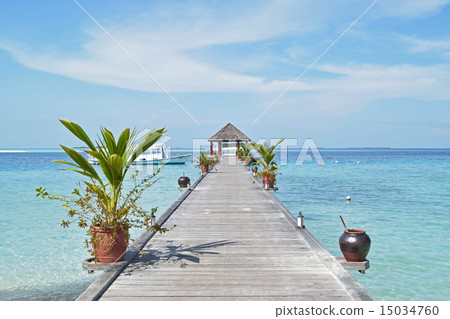 Pier leading to passenger boats at maldive Pier leading to passenger boats at maldive 15034760
