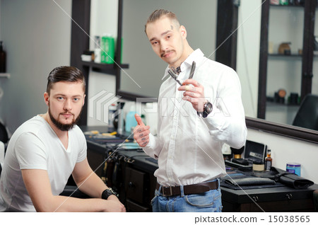 Male customer and a barber at barbershop Male customer and a barber at barbershop 15038565