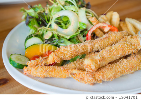 Traditional English food  Fish and chips and salad 15041701