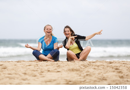 Girls having fun at the beach Girls having fun at the beach 15042358