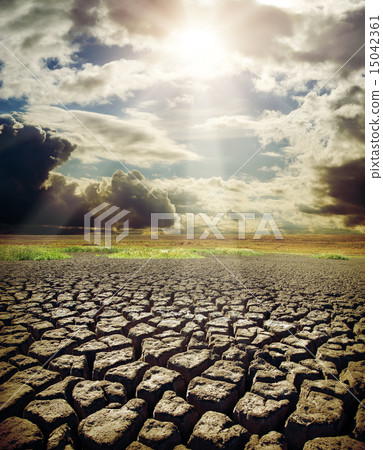 dry lake and dramatic sky with sun dry lake and dramatic sky with sun 15042361