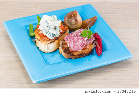 Tapas with cheese and salami 15045219