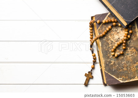 Wooden rosary beads with old book Wooden rosary beads with old book 15053603