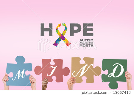 Composite image of hands holding up mind jigsaw pieces Composite image of hands holding up mind jigsaw pieces 15067413