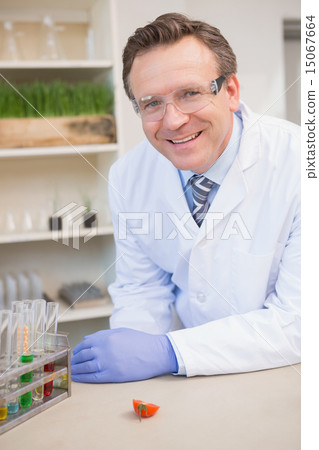 Happy scientist looking at camera 15067664