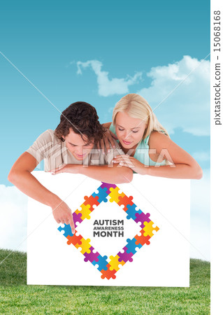 Composite image of man pointing on a whiteboard 15068168